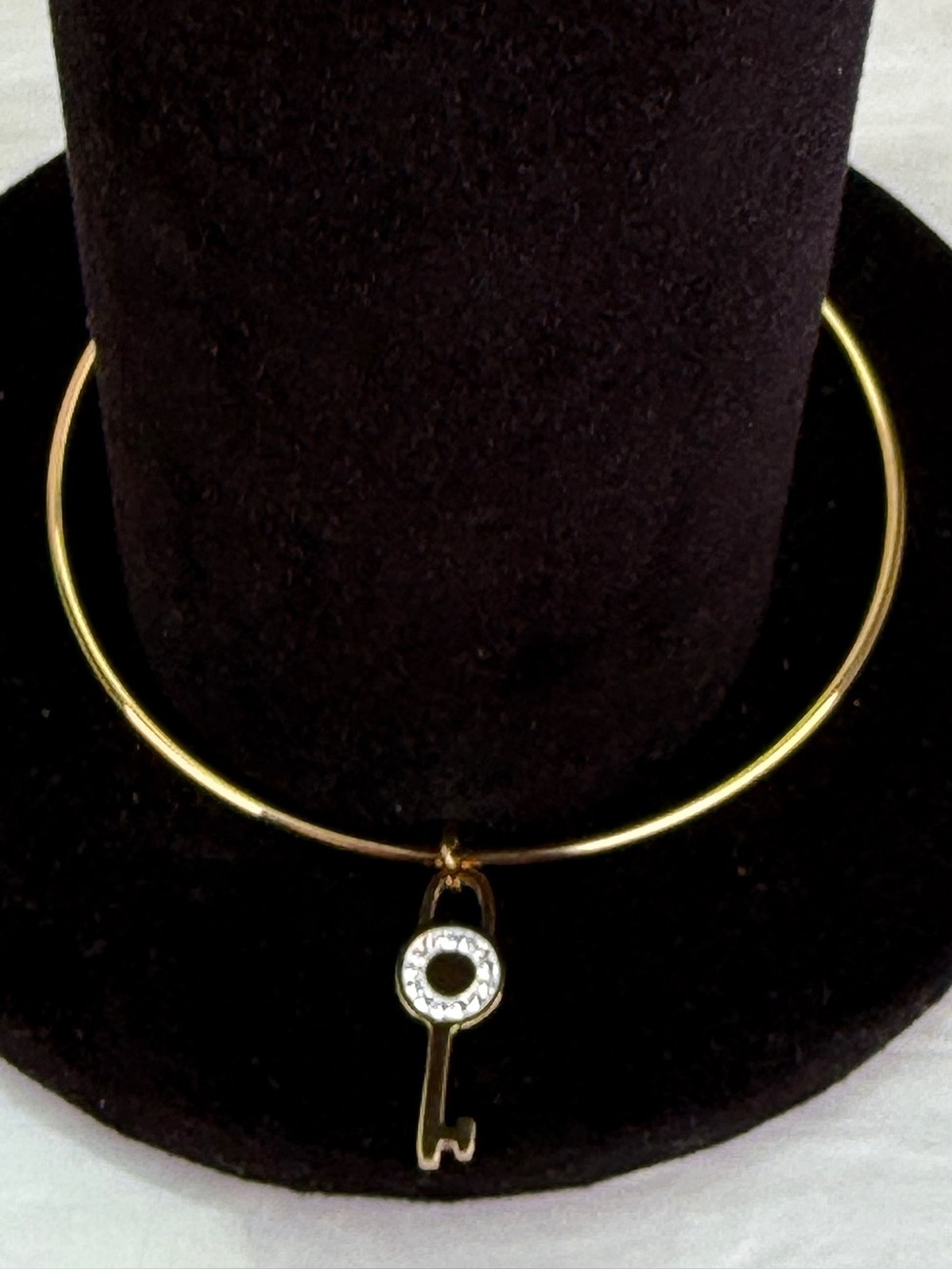 Goldtone Tiny Key Charm with Crystals on minimalist bangle bracelet